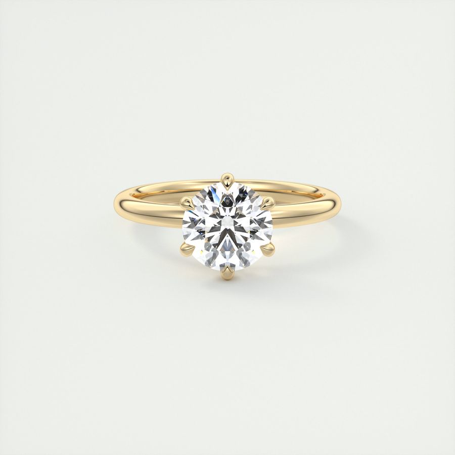 Frank Darling six prong round solitaire engagement ring with floral prongs and skinny band