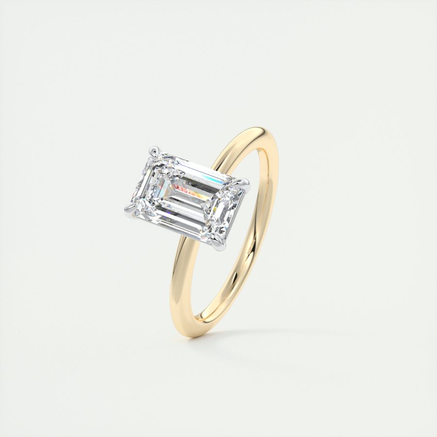 Two tone emerald hotsell cut engagement ring