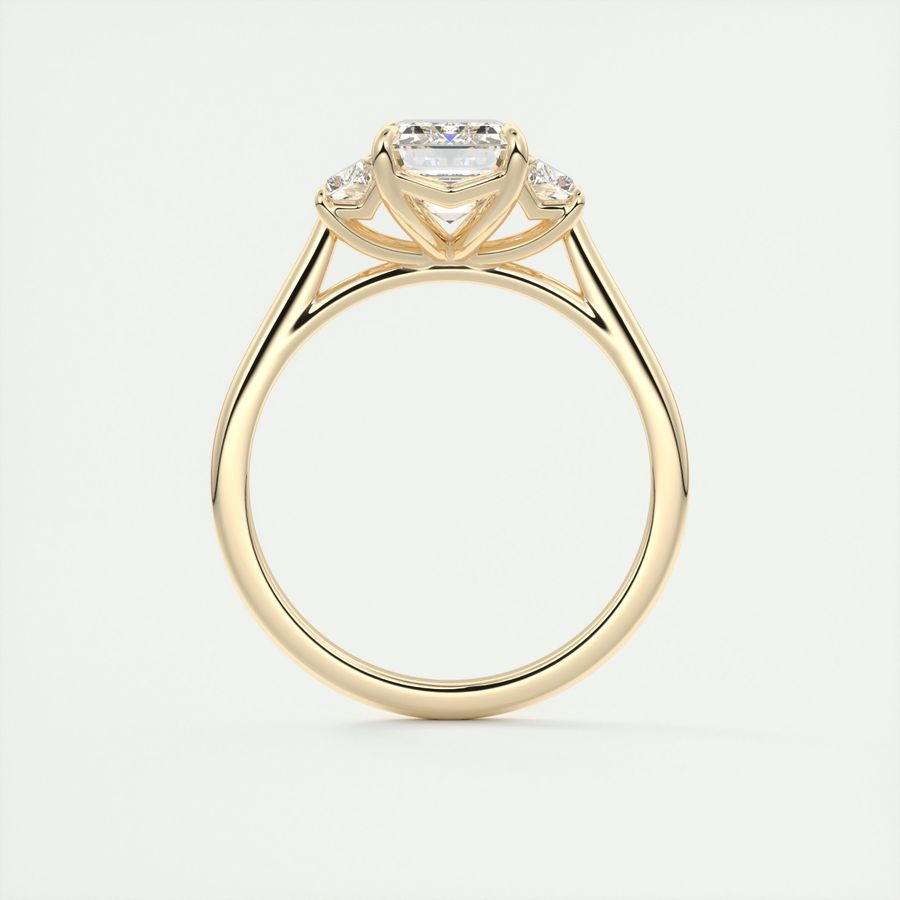 Emerald three stone Frank Darling diamond engagement ring with step cut trapezoid side stones in yellow gold