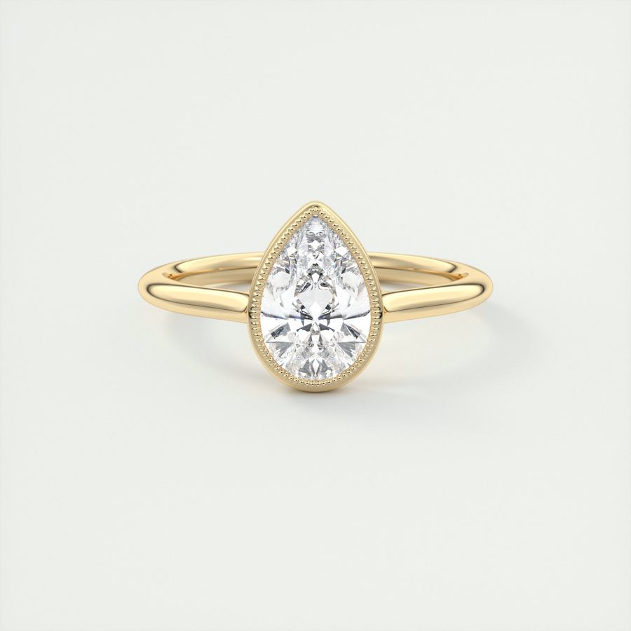 The Pear Milgrain Bezel Solitaire by Frank Darling