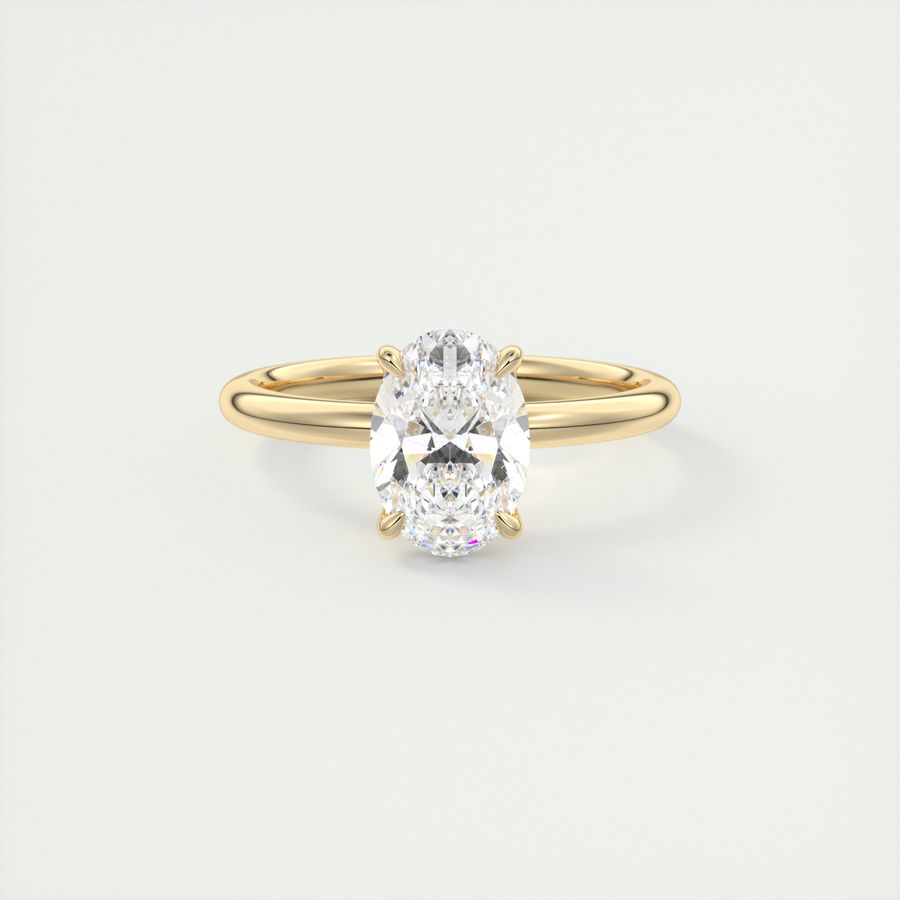 Oval cut solitaire Frank Darling lab grown diamond engagement ring with floral prongs, low profile basket and 1.8mm band in yellow gold