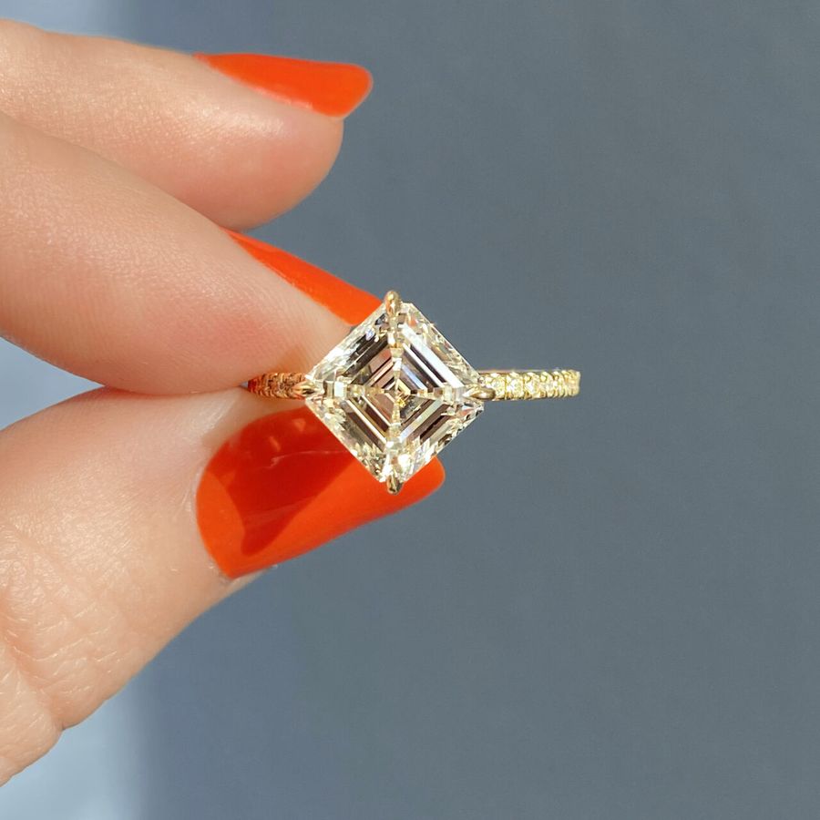 asscher cut diamond on hand