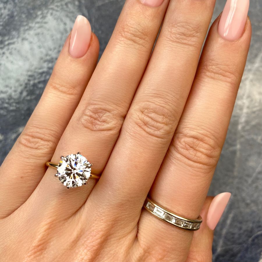 Round solitaire store engagement ring