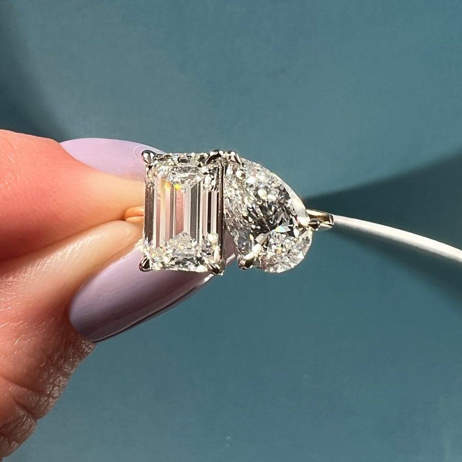 Famous emerald cut engagement on sale rings